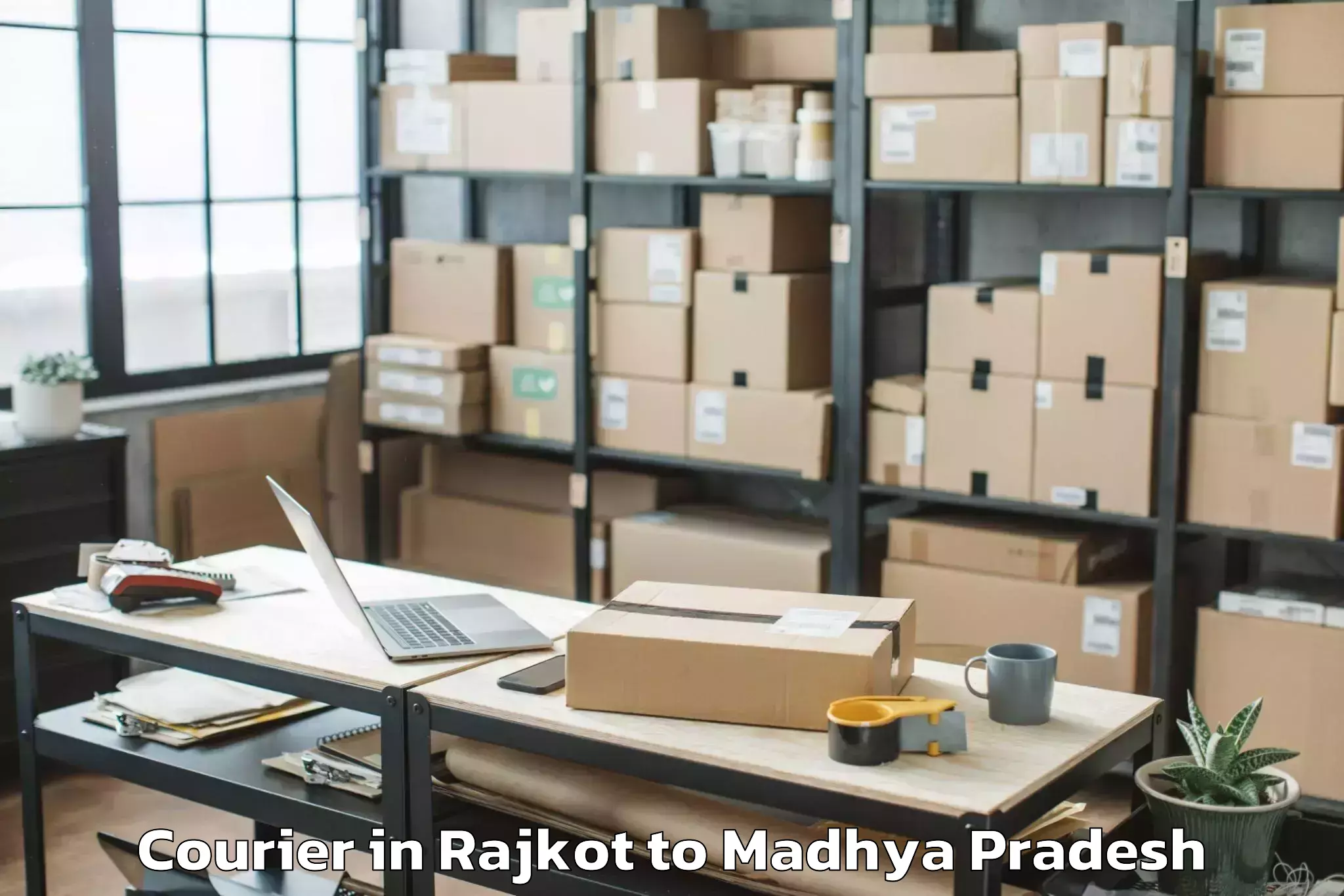 Book Rajkot to Ghugri Courier Online